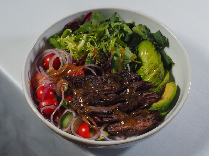Beef burrito bowl with black beans and salsa at GYG