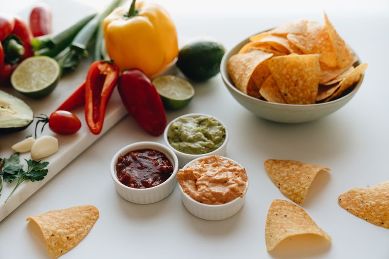 Fresh guacamole with corn chips at Guzman y Gomez